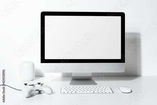 Blank computer screen on a table