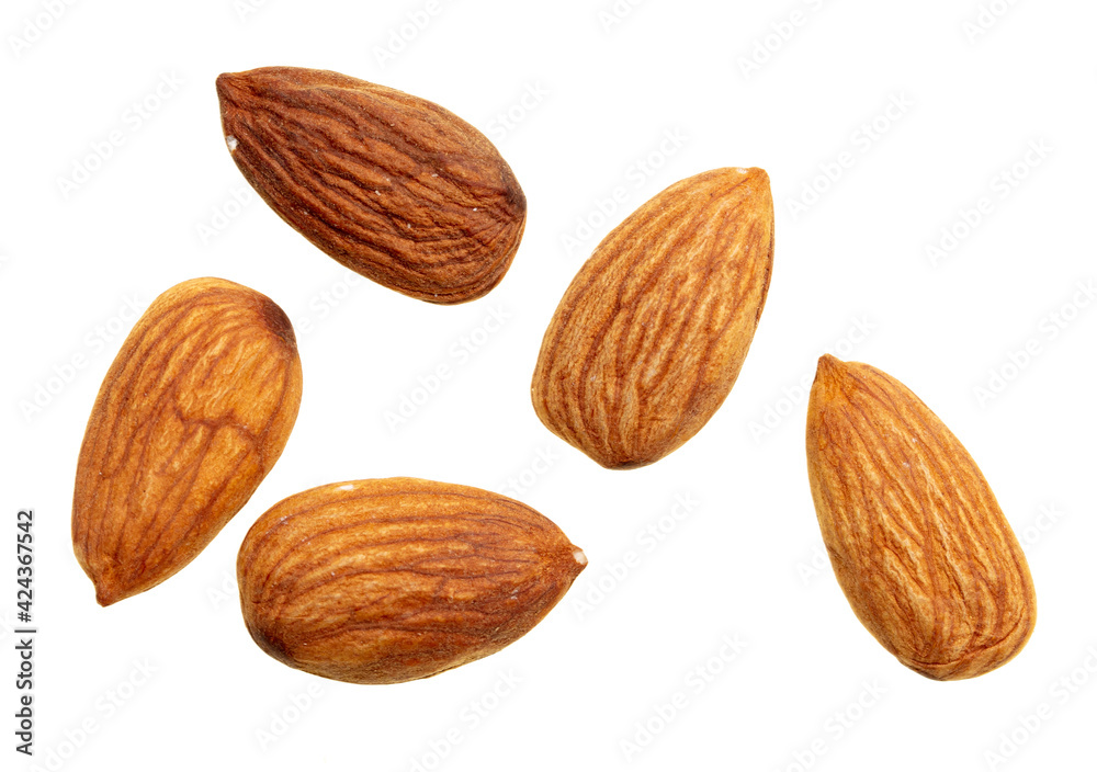 Close up of almond nuts isolated on white Close up of almond nuts isolated on white