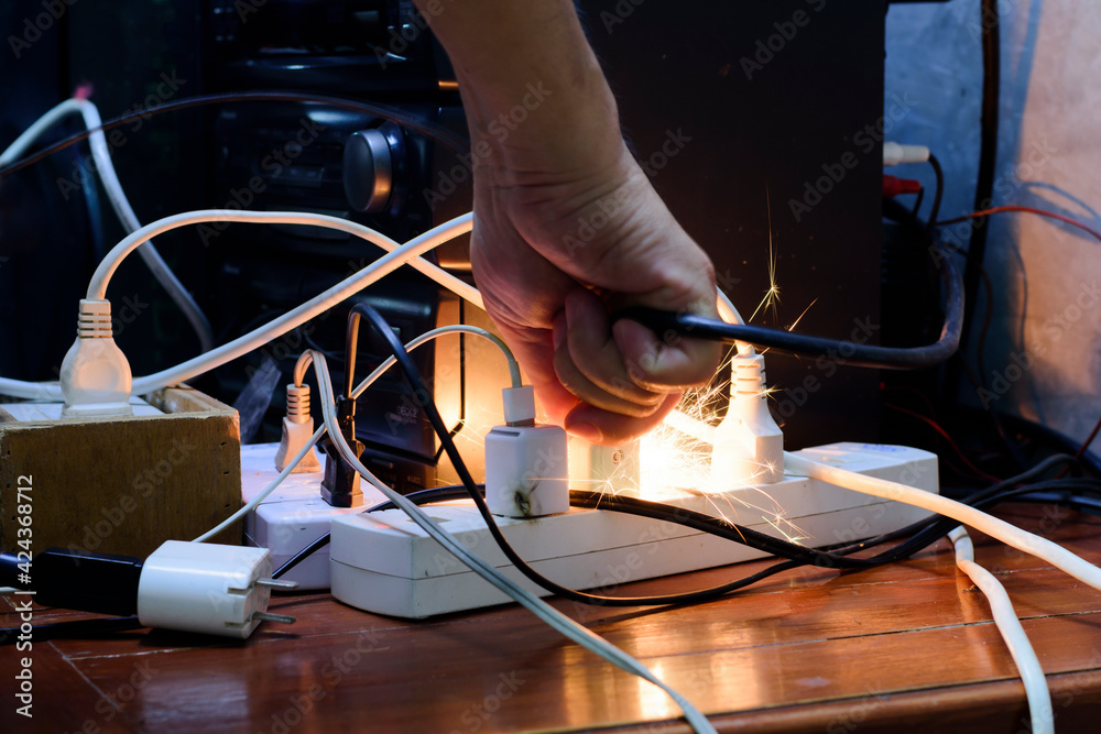 Shortcircuiting can cause arcing while the plug is being plugged in, the use of plugs or wires