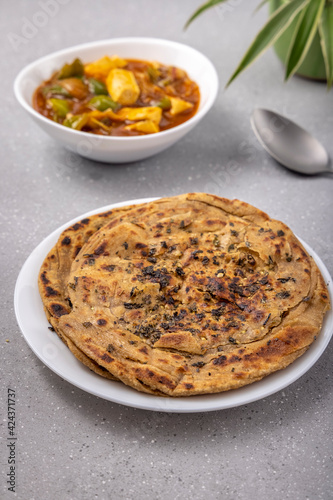 Lachha paratha or chur chur naan with chilli paneer