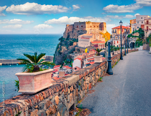 Сharm of the ancient cities of Europe. Picturesque morning view of Scilla town with Ruffo castle on background, administratively part of the Metropolitan City of Reggio Calabria, Italy, Europe. #424372573