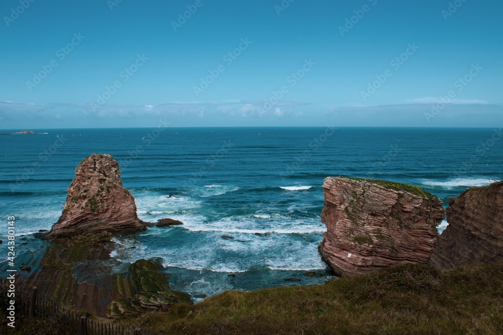 Fototapeta premium Rocks in the sea with low tide