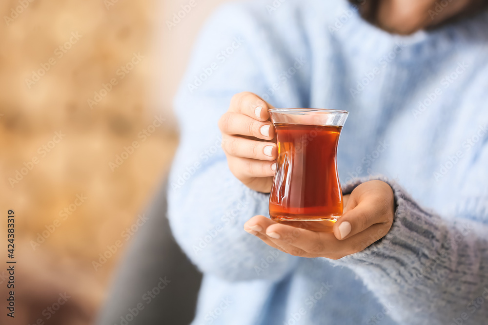 Woman with cup of hot tea, closeup Woman with cup of hot tea, closeup