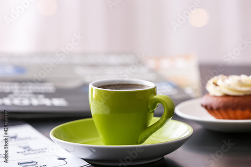 Green coffee cup with sauce...