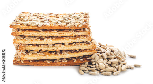 Schilderij op canvas Tasty crackers with seeds on white background