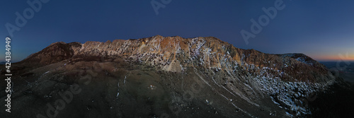 Wallpaper Mural 180 degree aerial drone shooting of the Madonie in winter with the rocky massif of Quacella. Sunset. Skiing at Piano Battaglia during the winter. Snow in Sicily. Madonie Park. Torontodigital.ca