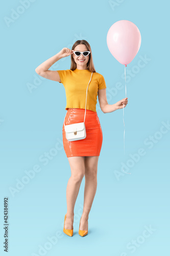Beautiful young woman with ...