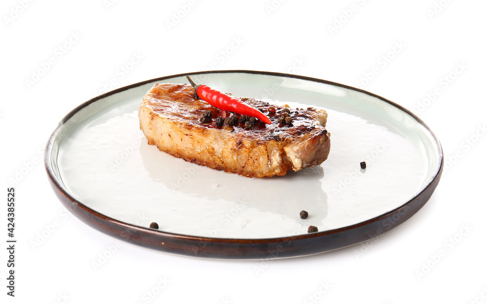 Plate with tasty steak and spices on white background Plate with tasty steak and spices on white background
