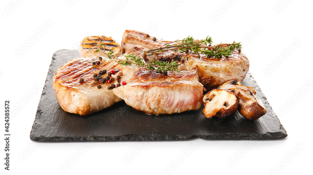 Board with tasty steaks and spices on white background Board with tasty steaks and spices on white background