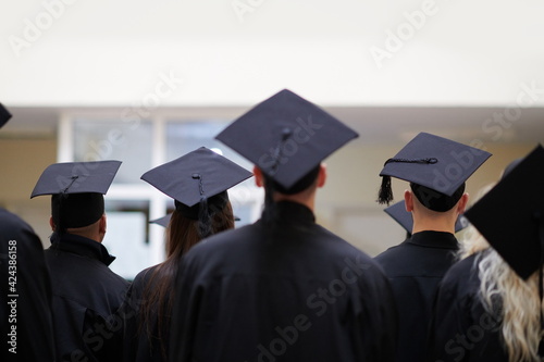 Group of diverse international graduating students celebrating