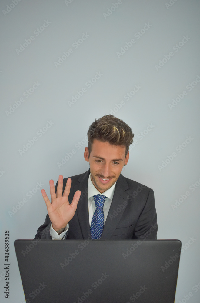 businessman in suit working at computer. businessman in suit working at computer.