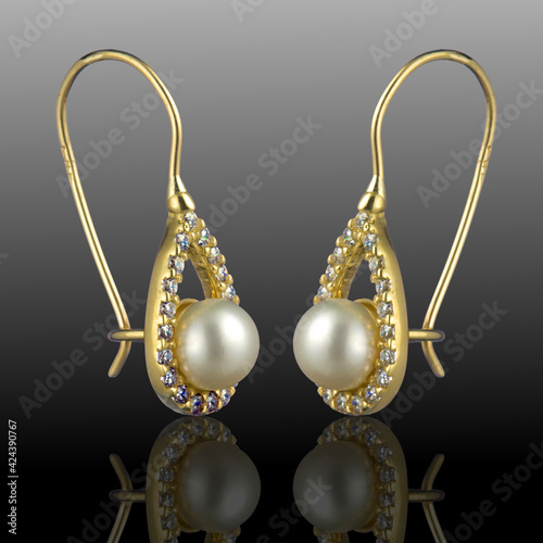 gold earrings with diamonds and pearls