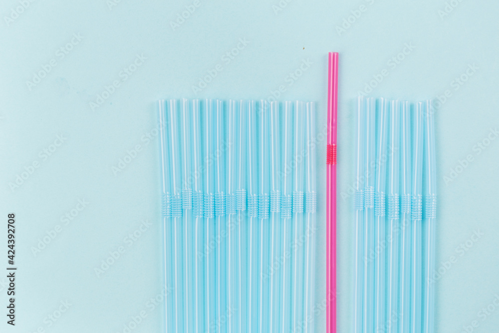 Concept about epidemic starts, many plastic straws and one different Concept about epidemic starts, many plastic straws and one different