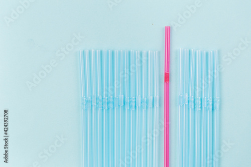 Concept about epidemic starts  many plastic straws and one different