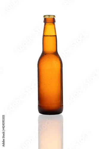 Bottle of beer on a white background with reflection
