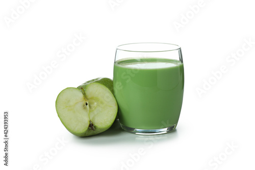 Glass of green smoothie and apples isolated on white background