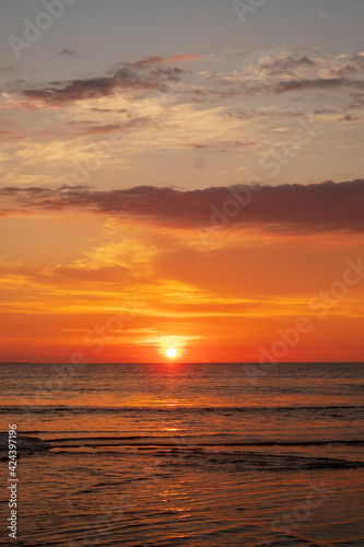 Beautiful sunset over ocean. Seascape and cloudscape concept
