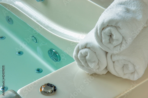 Fototapeta White towel on the hot tub