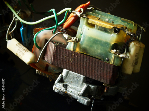 Internal part of a vintage electronic device with power tranformer and other components. photo