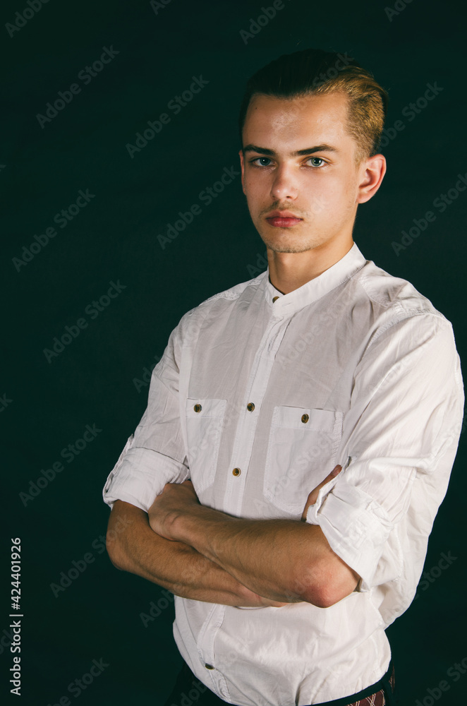 Portrait of a young attractive guy with blue eyes. Portrait of a young attractive guy with blue eyes.