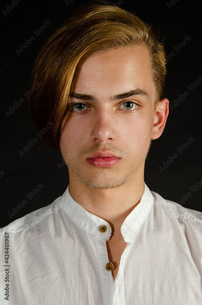 Portrait of a young attractive guy with blue eyes. Portrait of a young attractive guy with blue eyes.