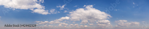 Wide sky panorama with scattered cumulus clouds © yelantsevv