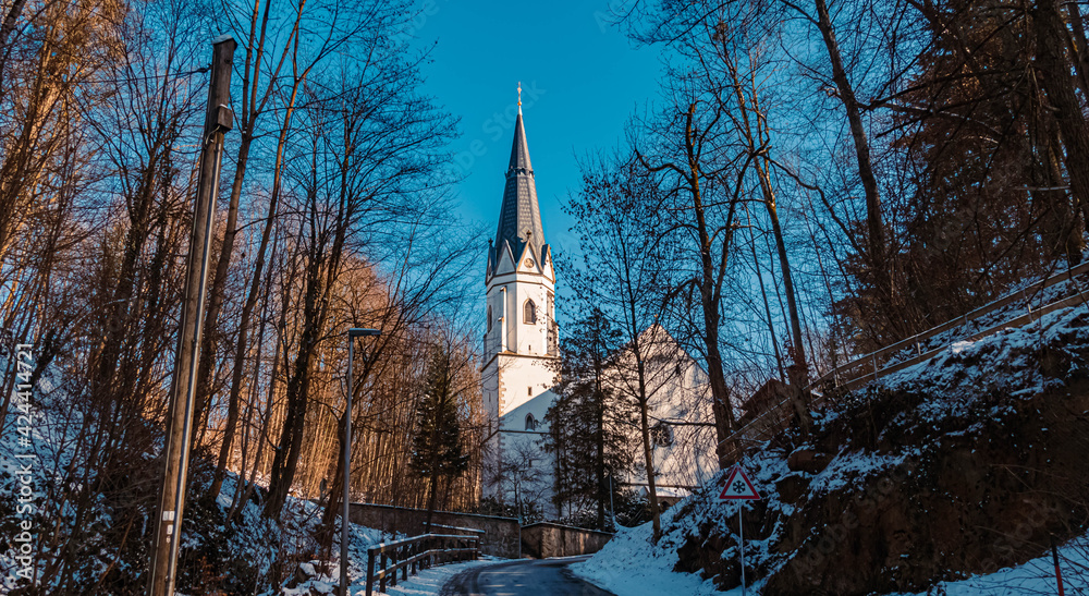 Winter landscape shot with a church at the Geiersberg near Deggendorf, Bavaria, Germany