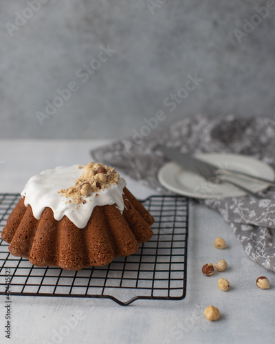 Delicious freshly baked Easter cake on grey background