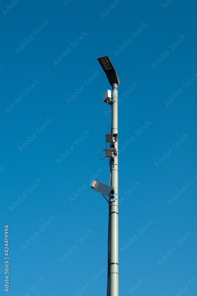 supervision cameras installed at the post of a streetlamp supervision cameras installed at the post of a streetlamp