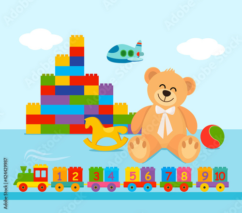 A large set of toys for toddlers. constructor, ball, teddy bear, train with numbers from 1 to 10