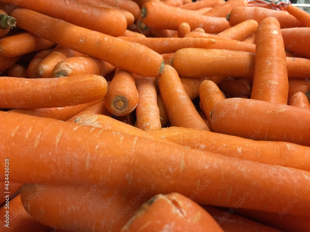 group of carrot in market for sale group of carrot in market for sale