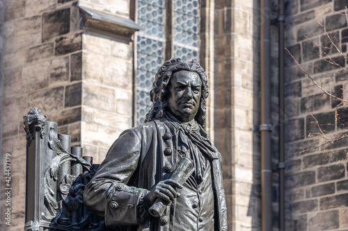 Leipzig, Saxony, Germany, 03-31-2021 Monument to the Thomaskantor and composer Johann Sebastian Bach in front of the Thomaskirche © Uwe