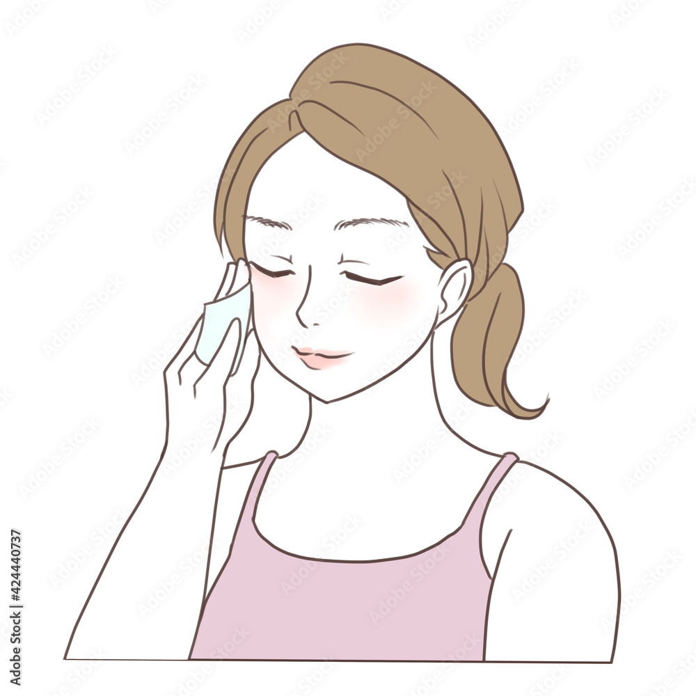 コットンでスキンケアやベースメイクをする女性　美容