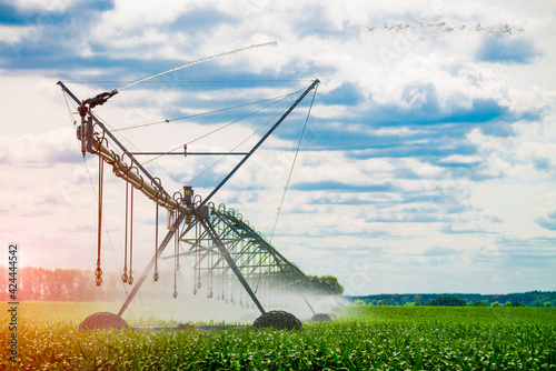 An irrigation pivot watering a field, beautiful view