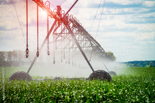 Photos An irrigation pivot watering a field, beautiful view