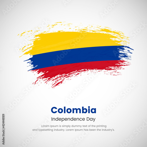 Brush painted grunge flag of Colombia country. Independence day of Colombia. Abstract creative painted grunge brush flag background.