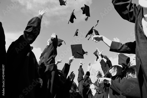 Photos Group of diverse international graduating students celebrating