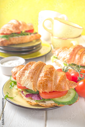 Croissant sandwich with fresh vegetables