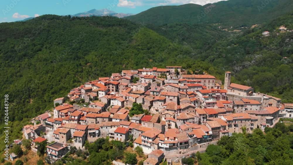 Aerial view of rural village of Capradosso in central Italy Offeio, Petrella Salto, Rieti, Italy (Strada Regionale 578 Cicolana) Old settlements. Top of the mountain. The hinterland of the country. Aerial view of rural village of Capradosso in central Italy Offeio, Petrella Salto, Rieti, Italy (Strada Regionale 578 Cicolana) Old settlements. Top of the mountain. The hinterland of the country.
