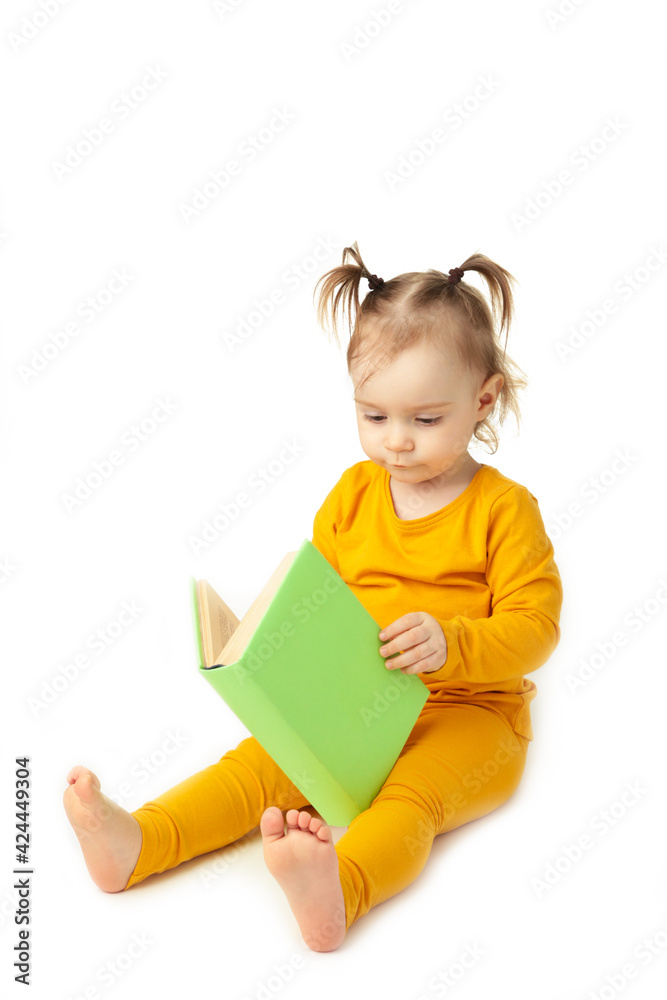 Little girl reading isolated on white. Cute baby with book Little girl reading isolated on white. Cute baby with book