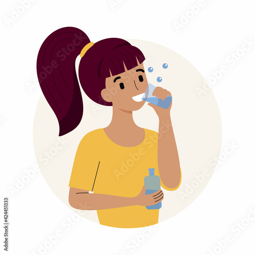 The girl uses a mouthwash. Dental and oral hygiene.