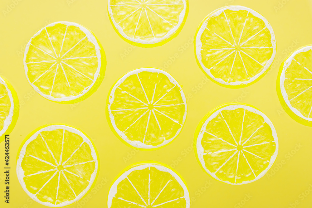 Pattern background. Pattern a lemon on a yellow background. The summer background.