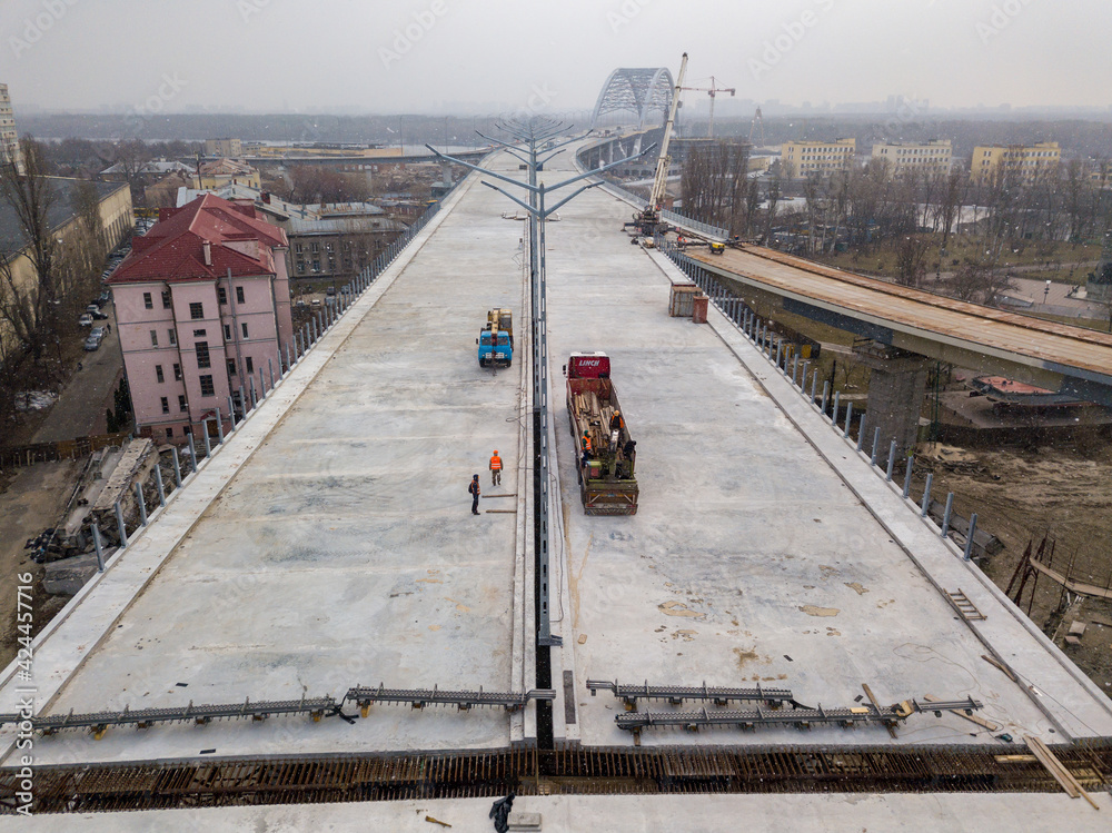 Naklejka premium Bridge under construction in Kiev. Aerial drone view.