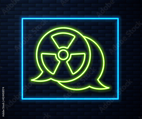 Glowing neon line Radioactive icon isolated on brick wall background. Radioactive toxic symbol. Radiation Hazard sign. Vector