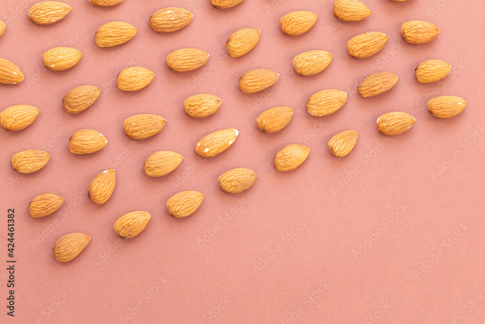 group of nuts on brown background, healthy food concept, empty space for text
group of nuts on brown background, healthy food concept, empty space for text