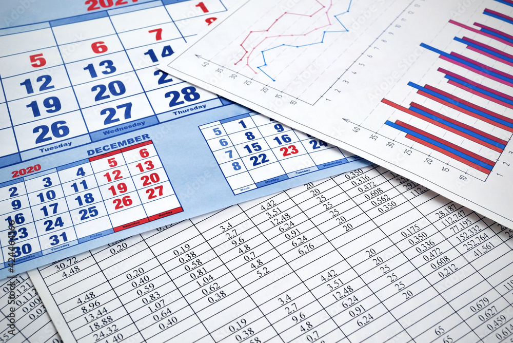 Photos of charts, diagrams and numbers showing the rise and fall in the market Photos of charts, diagrams and numbers showing the rise and fall in the market