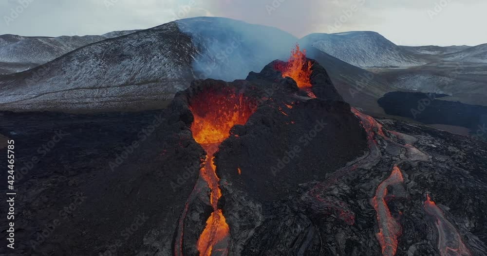 4K Drone aerial video of Iceland Volcanic eruption 2021. The volcano Fagradalsfjall is located in the valley Geldingadalir close to Grindavik and Reykjavik. Hot lava and magma coming out of the crater