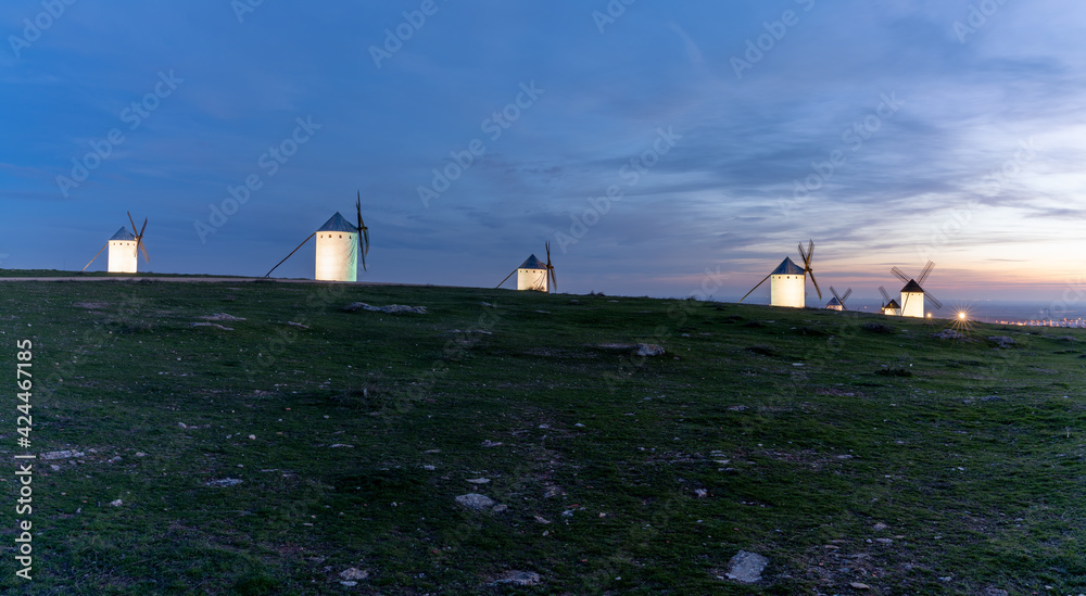 panorama view of the historic white windmills of La Mancha above the town of Campo de Criptana panorama view of the historic white windmills of La Mancha above the town of Campo de Criptana