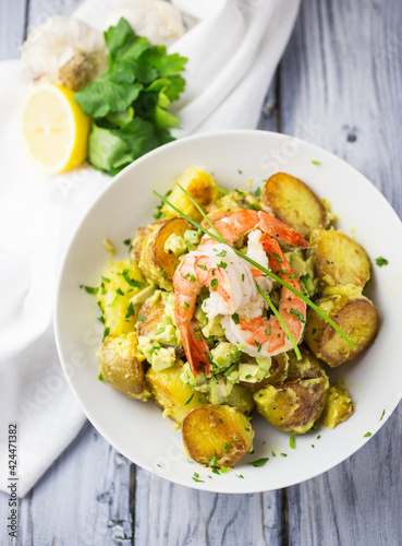 Potato salad with avocado and prawns