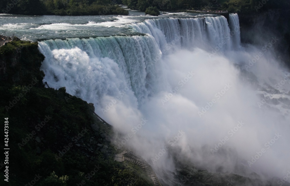 Huge and strong Niagara falls view, splash of the water Huge and strong Niagara falls view, splash of the water